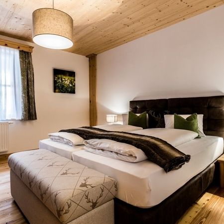 Gemütliches Schlafzimmer mit Doppelbett im Doppelzimmer Bergwiese